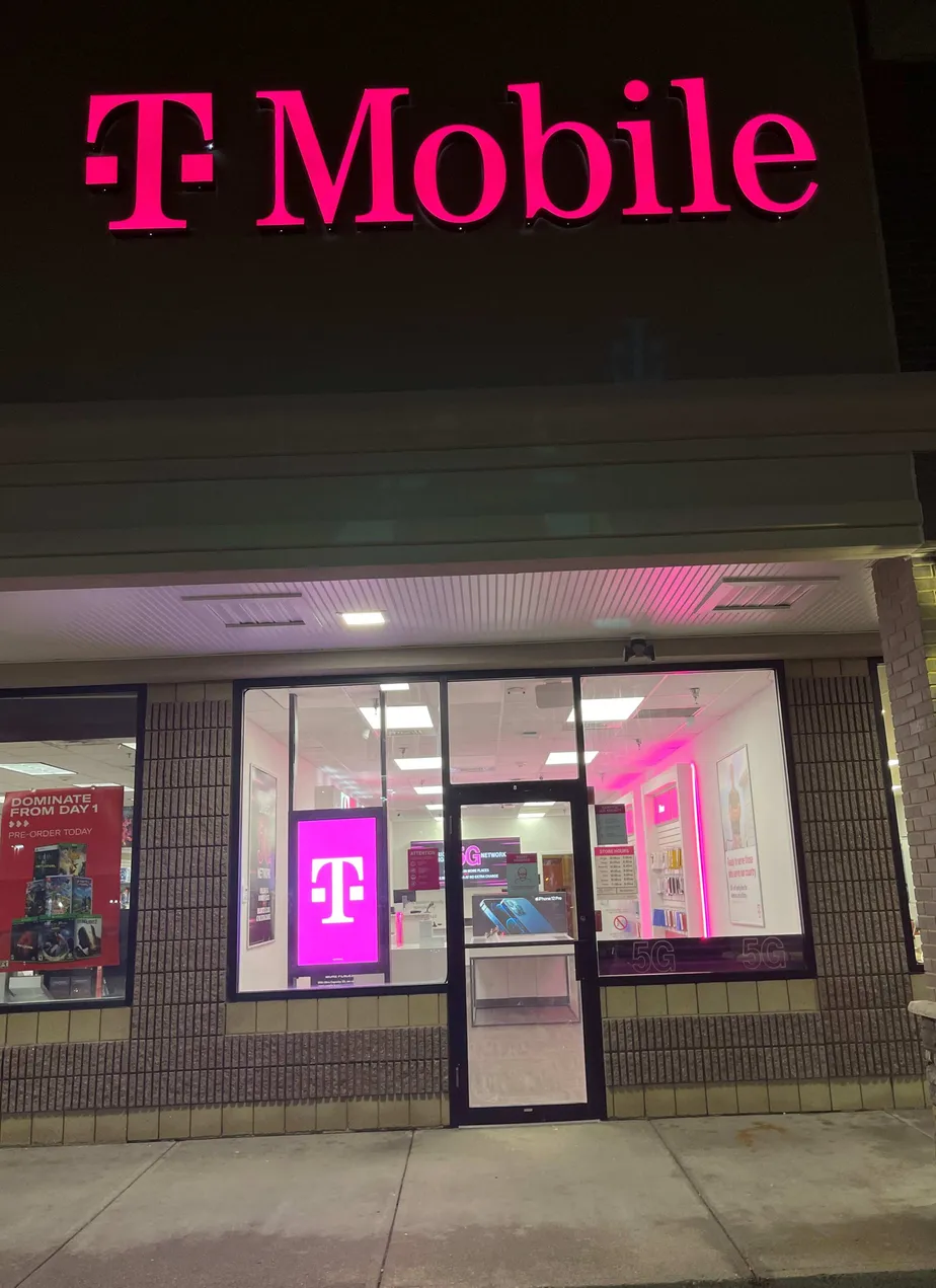 Exterior photo of T-Mobile store at Colby Ct & River Rd, Bedford, NH