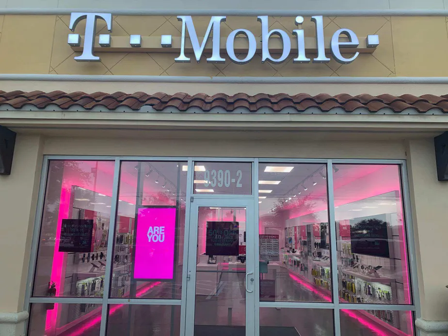 Exterior photo of T-Mobile store at Six Mile Cypress Pkwy & Challenger Blvd, Fort Myers, FL
