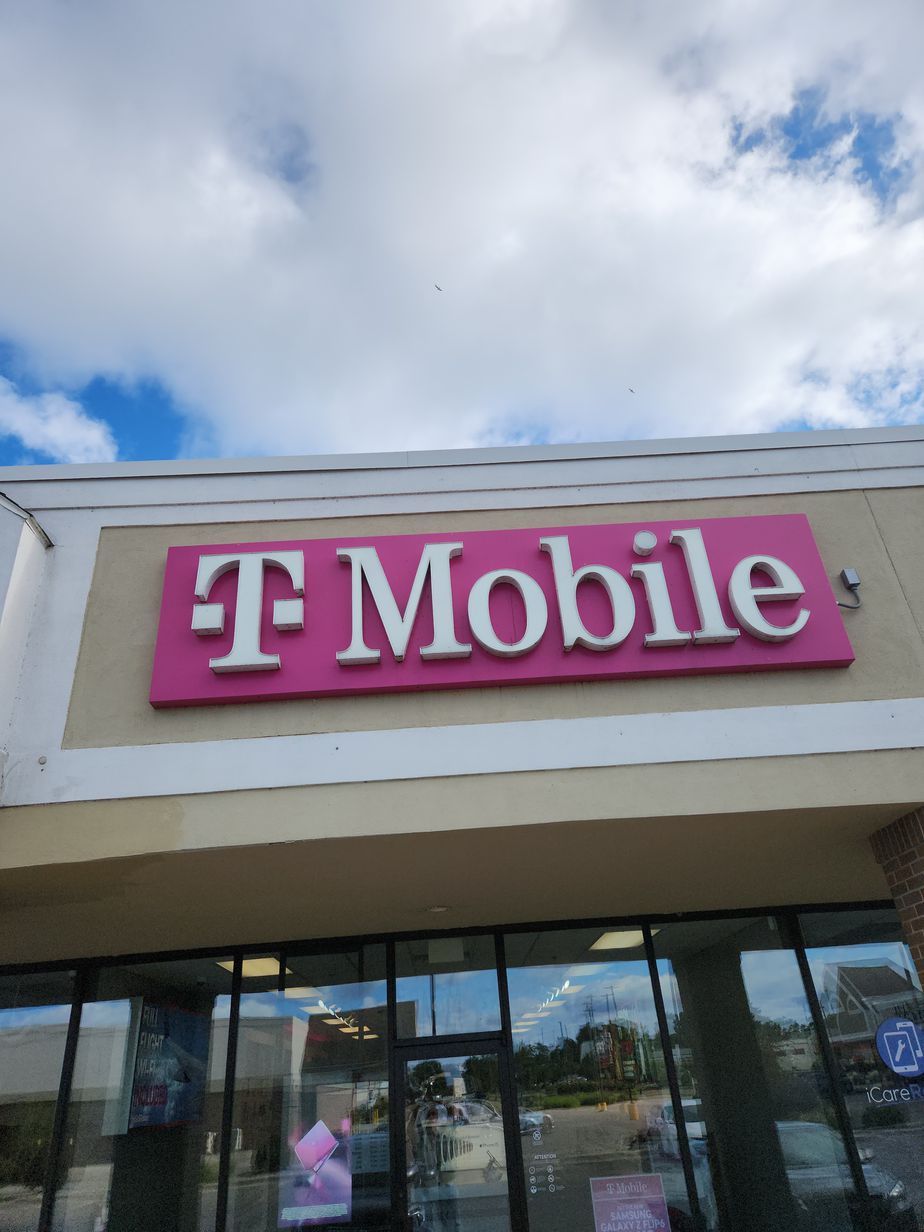 Exterior photo of T-Mobile Store at N Beacon Blvd & Adams Ave, Grand Haven, MI