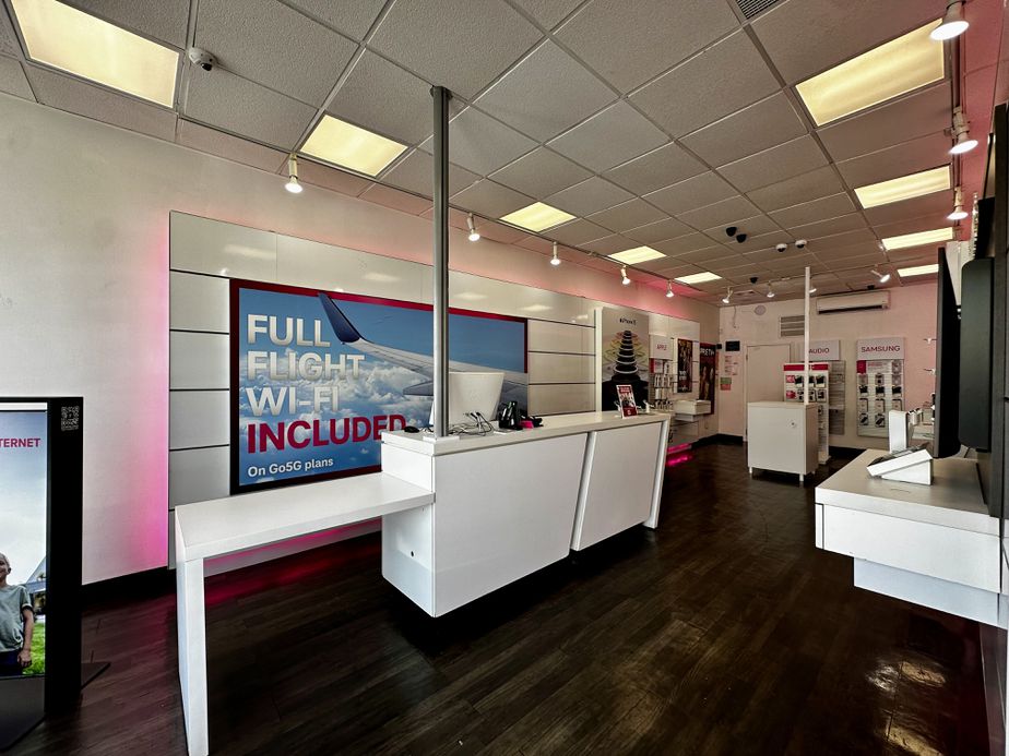 Interior photo of T-Mobile Store at Main & 57th Rd, Flushing, NY