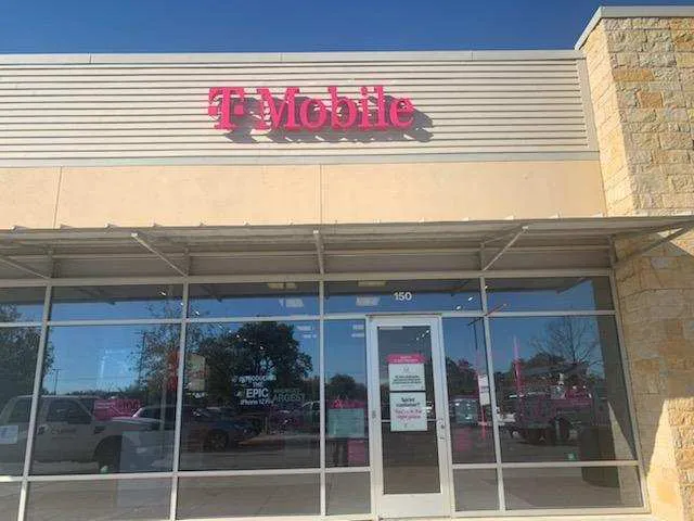 Exterior photo of T-Mobile store at University Blvd & University Oaks Blvd, Round Rock, TX