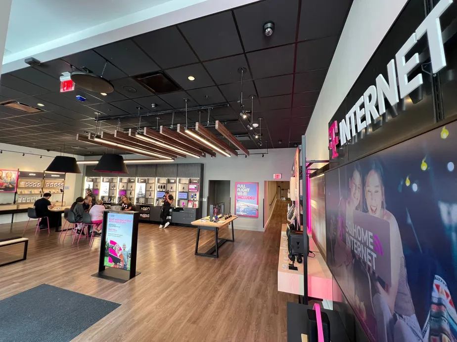  Interior photo of T-Mobile Store at Grove Central, Miami, FL 