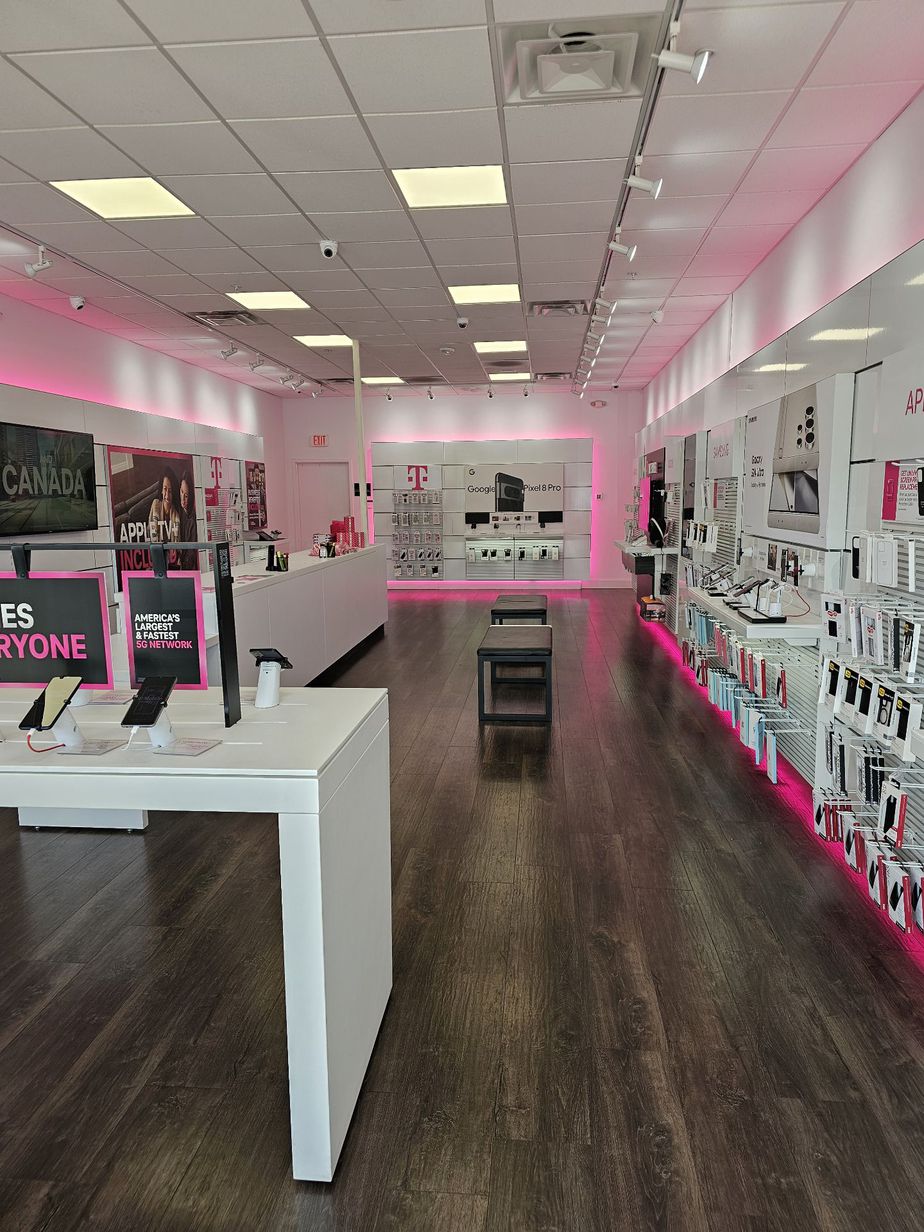 Interior photo of T-Mobile Store at Bristow Center Dr & Linton Hall Rd, Bristow, VA