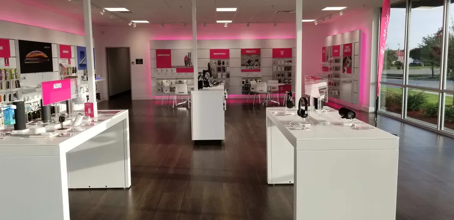 Interior photo of T-Mobile Store at W Pioneer Pkwy & Hwy 161, Grand Prairie, TX