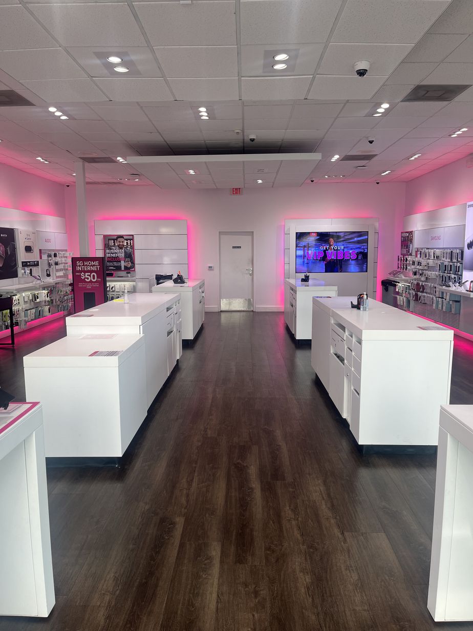 Interior photo of T-Mobile Store at The Shops at Royal Oaks, Houston, TX