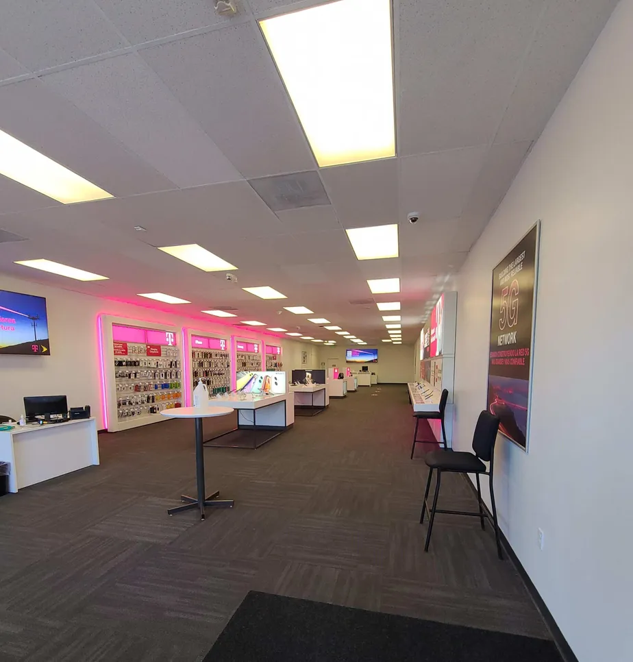 Interior photo of T-Mobile Store at S Federal Blvd & W Asbury Ave, Denver, CO