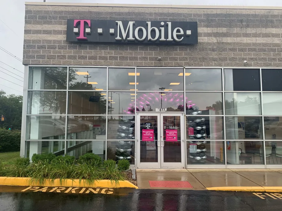 Exterior photo of T-Mobile store at W Florissant & Festival Drive 2, St. Louis, MO