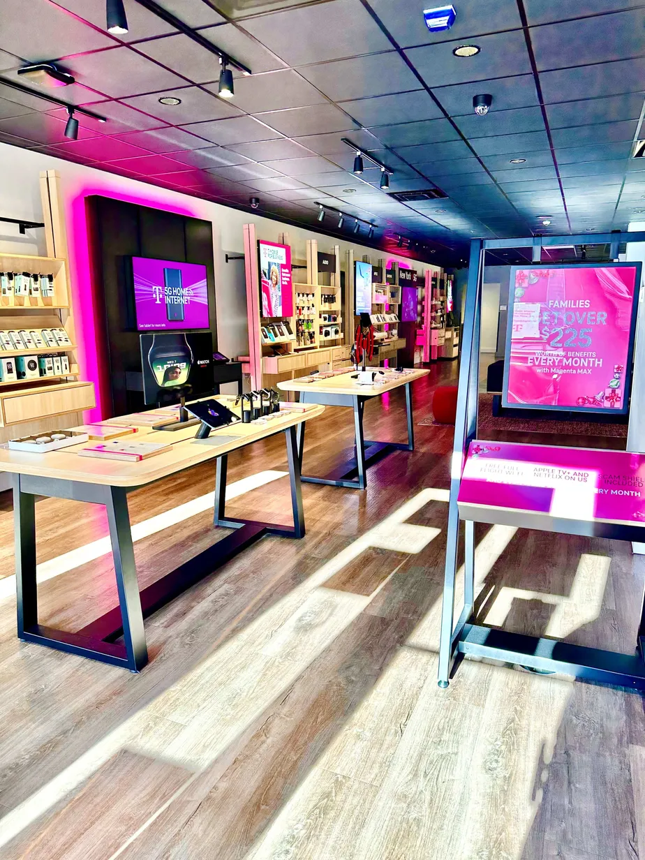 Interior photo of T-Mobile Store at Austin St & Continental Ave, Forest Hills, NY