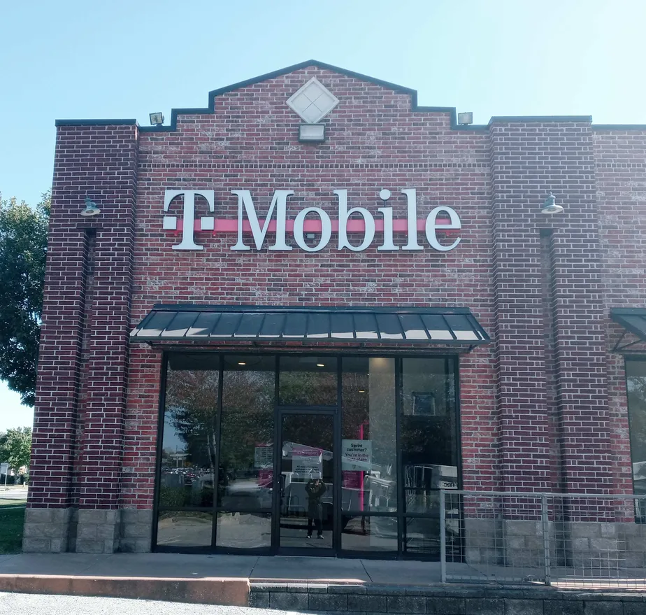 Exterior photo of T-Mobile store at W Martin Luther King Blvd & W Farmers Dr, Fayetteville, AR