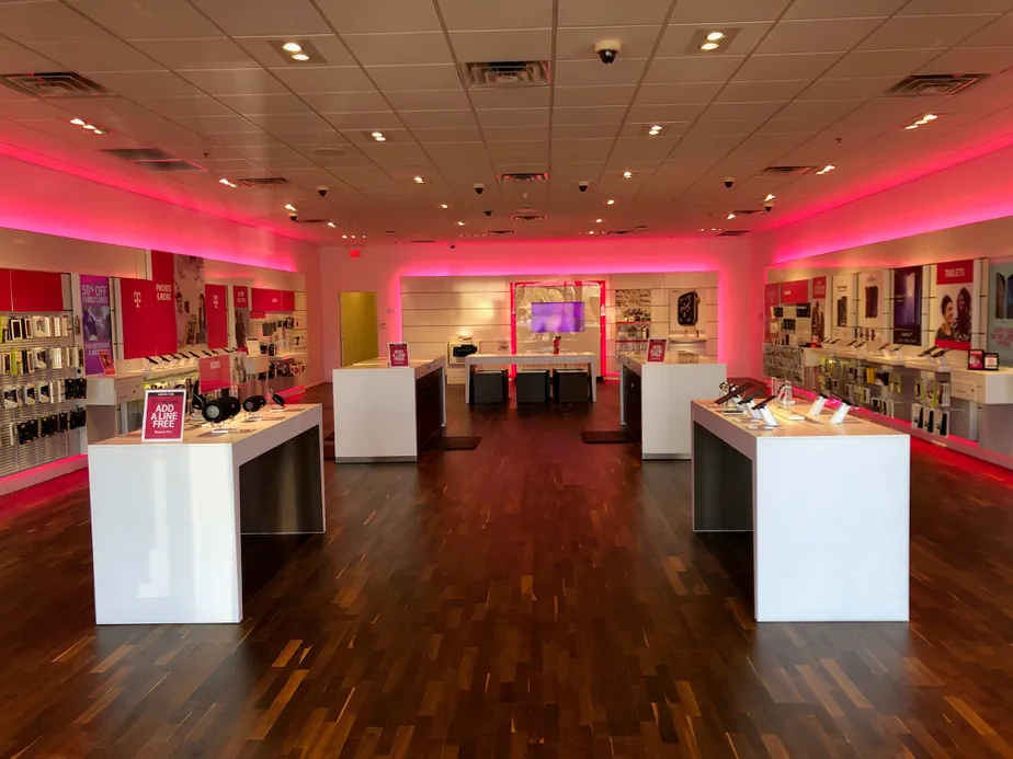 Interior photo of T-Mobile Store at Academy & Shrider, Colorado Springs, CO