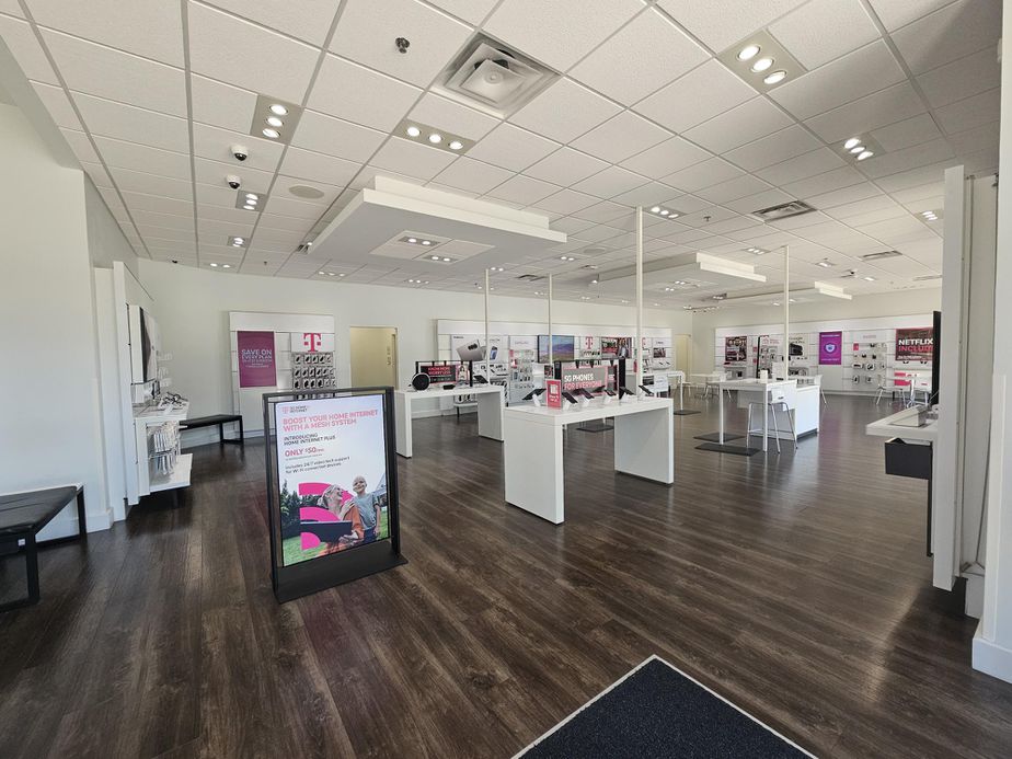 Interior photo of T-Mobile Store at Fm 407 & Fm 2499, Lewisville, TX