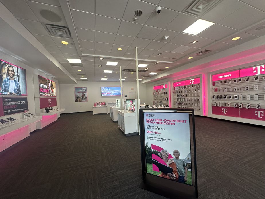 Interior photo of T-Mobile Store at Dallas Pkwy & Trinity Mills Rd, Dallas, TX