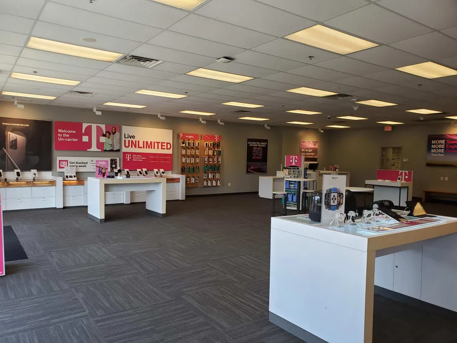 Interior photo of T-Mobile Store at Poyner Village Pkwy & Middle Poyner Dr, Raleigh, NC