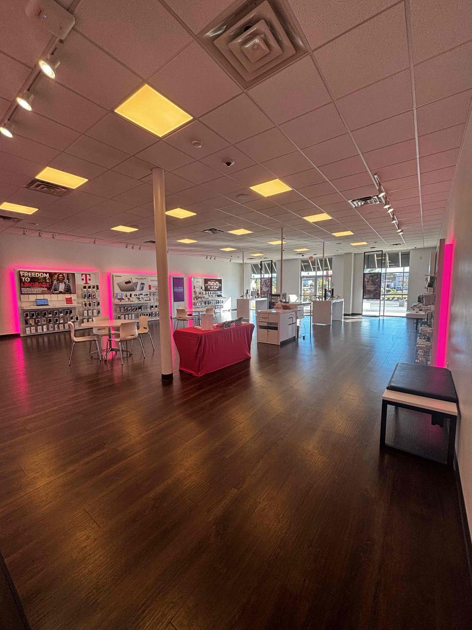 Interior photo of T-Mobile Store at Promenade & Rife Medical, Rogers, AR