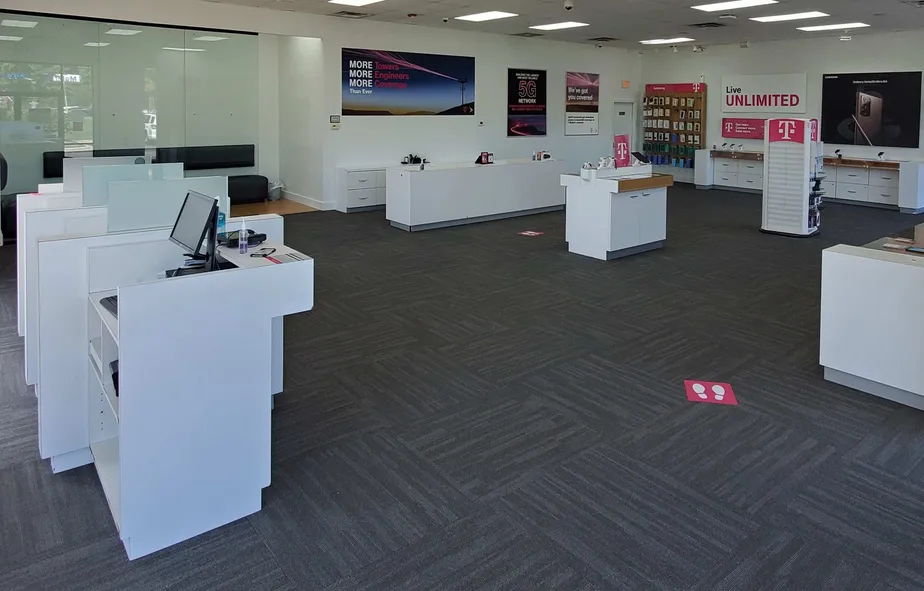  Interior photo of T-Mobile Store at W Grand River Ave & Marsh Rd, Okemos, MI 