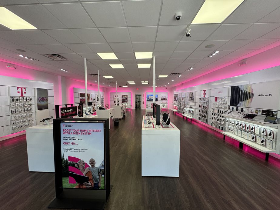 Interior photo of T-Mobile Store at Hwy 6 & Riverstone, Missouri City, TX