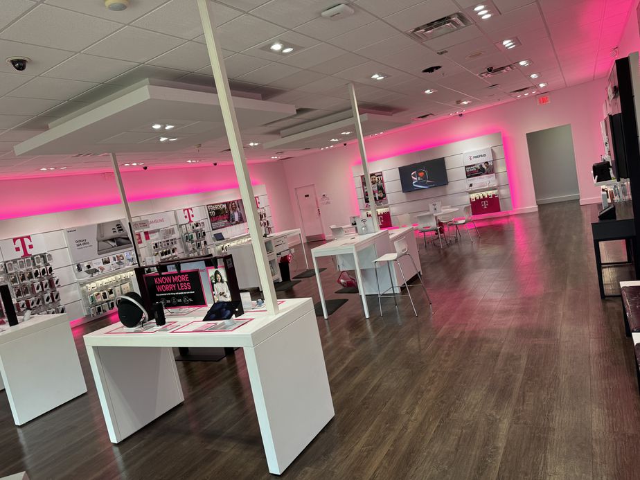Interior photo of T-Mobile Store at Ridge Rd & Little Rd, New Port Richey, FL