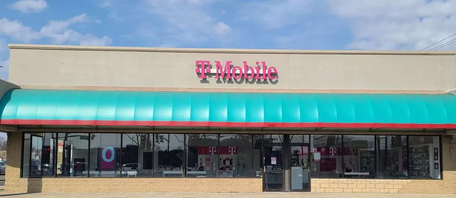 Exterior photo of T-Mobile store at W Diversey Ave & N Kenton Ave, Chicago, IL