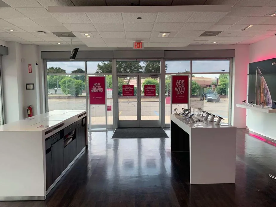 Interior photo of T-Mobile Store at M-39 & Outer Dr, Allen Park, MI