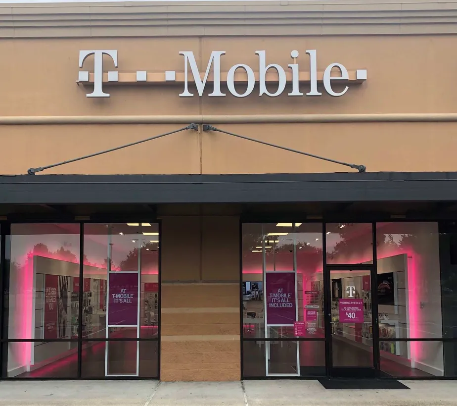Exterior photo of T-Mobile store at Ambassador Caffrey & Kaliste Saloon, Lafayette, LA