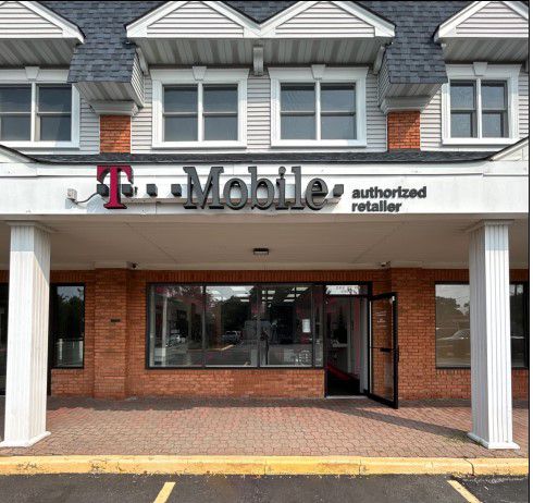 Exterior photo of T-Mobile Store at Rt 112 & Hallock Ave, Port Jefferson Station, NY