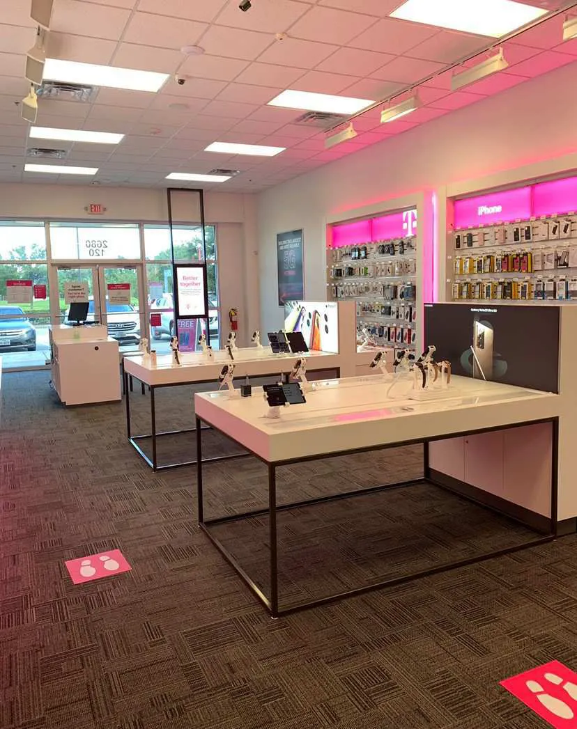 Interior photo of T-Mobile Store at Pearland Pkwy & Province Village Dr, Pearland, TX